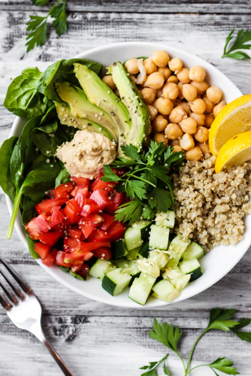 greek quinoa bowl overhead shot with chickpeas and avocado