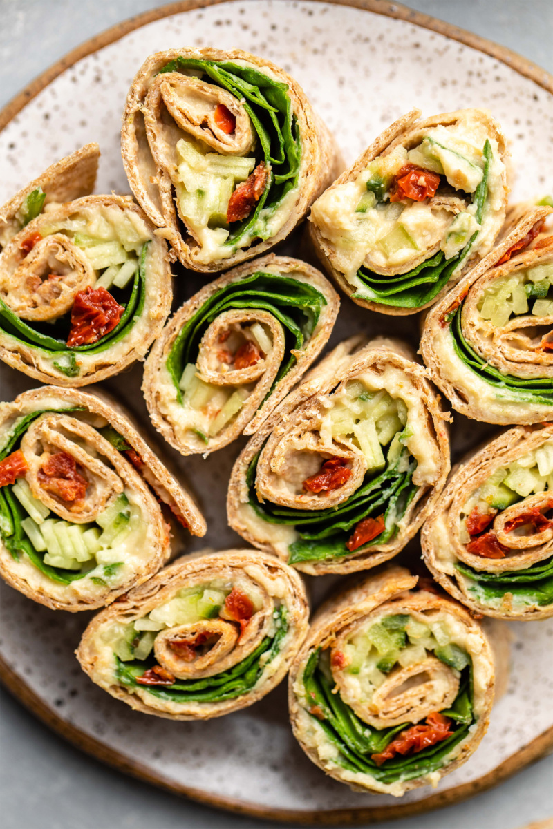 vegan pinwheels filled with veggies and hummus