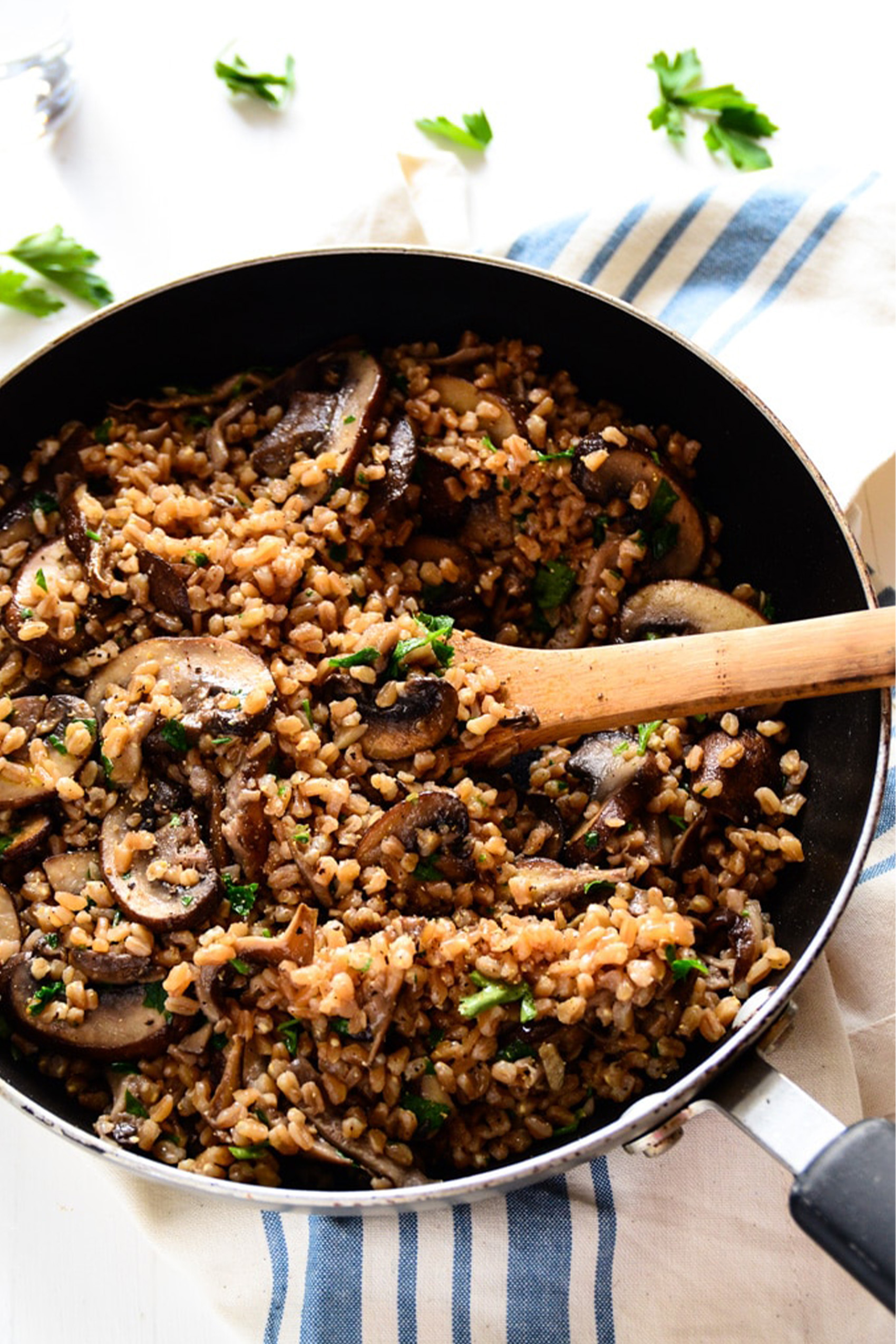 a skillet of mushroom farro