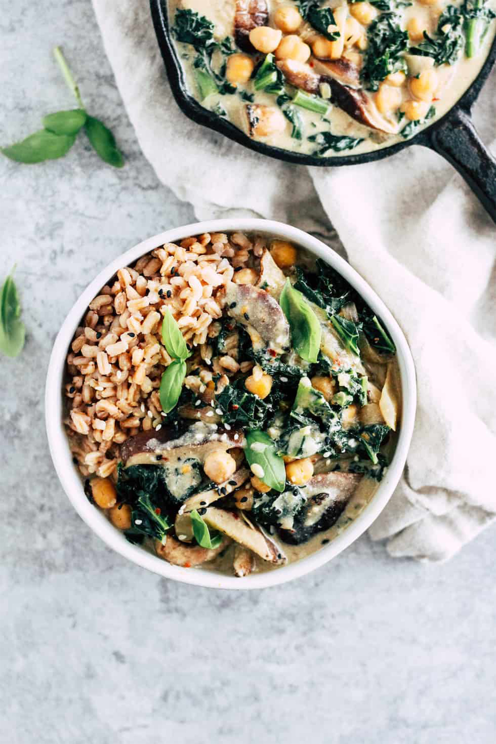 a bowl of mushrooms served with grains